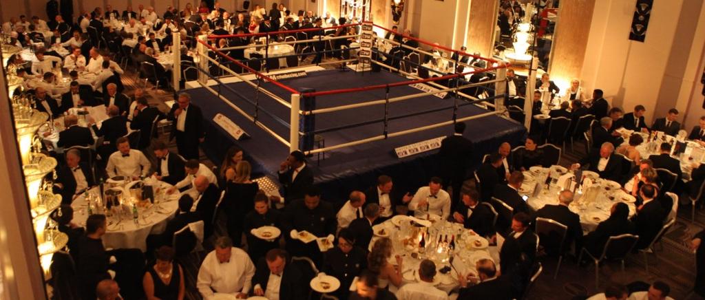 During The Event Exclusive pop-up banner (2 x max 1.2m wide) at the Champagne Reception. A Sponsor Ringside Table of 9, with company branding, joined by an exboxer. Company Logo on two corner posts.