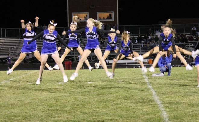 Left The D13 Cheer Squad jumps for joy at half time. defense to keep a talented QB and RB in check.