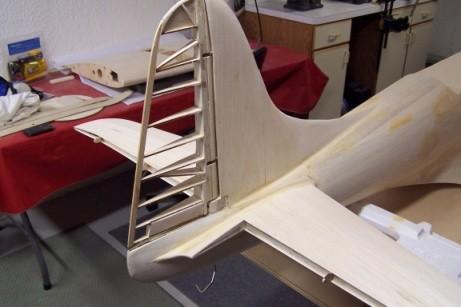 The most difficult job of the build thus far was sheathing the fuselage. First of all where do you start? The plans call for sheeting the top and covering toward the bottom. OK front or back first?