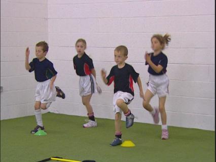 ACTIVITY 2 RUNNING - HEEL FLICKS HURLING / FOOTBALL FITNESS EXERCISE This exercise to develop running skills is generally suitable for players of 4-6 years In a stationary position hold the arms