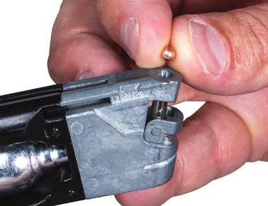 Carefully press the grip back into place and replace the magazine. Figure 4 Figure 5 Position the air pistol in a SAFE DIRECTION, take OFF SAFE (See Step 4.