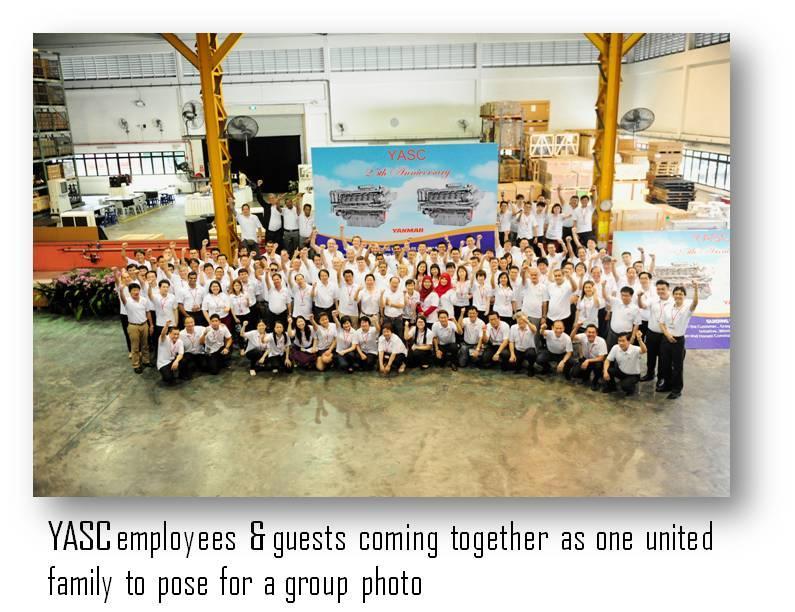 At the end of all the morning activities, a group photo is taken against the backdrop showcasing one of Yanmar s latest