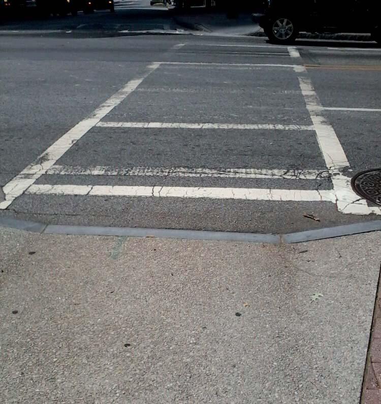 Coordinate with the City of Atlanta in order to have these problems fixed. Repaint all faded striping.