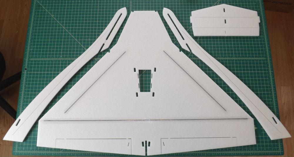 3 In this photo, we ve assembled the 3 main wing panels and glued all the carbon spars into their respective slots. At top right is the horizontal stab.