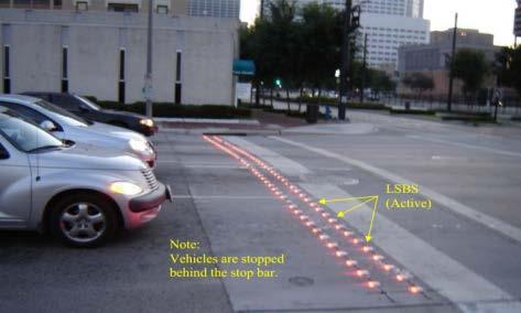 signalized intersections. LSBS consists of markers installed into the pavement along the stop line of an intersection.