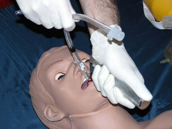 Oral, nasal or digital intubation can be practiced. Here the provider uses a MAC 3.