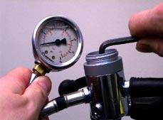 If your test gauge does not have an over pressure relief valve, you must also attach a proplery adjusted second stage to the first stage to act as the relief valve in case of a HP