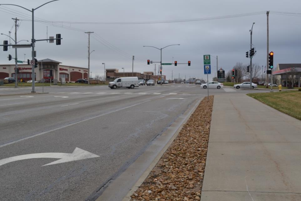 Figure 4.22 shows a ground view of the intersection facing eastbound. As shown, each approach has a raised median with the traffic signal pole and mast arm located in the center of the intersection.
