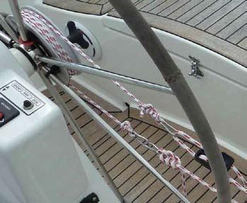 The more you tension the cord, the more the block pulls the slack out of the steering lines. Releasing this block provides sufficient slack to uncouple the four snap shackles at the connection point.