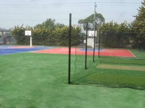 half basketball court and three cricket practice wicket.