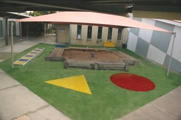 grass surface was installed across the asphalt surface to provide the college with a