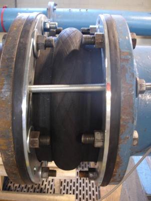 17 Figure 3. Flexible rubber expansion joint. The pipe was installed directly into the crown of the 12-in PVC pipe. A 0.