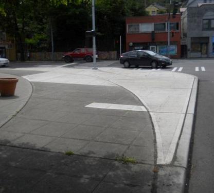 Curb Radius Reduction DESCRIPTION Reducing the curb radius at an intersection reduces the intersection footprint PURPOSE Smaller radii can improve safety by requiring motorists to reduce vehicle
