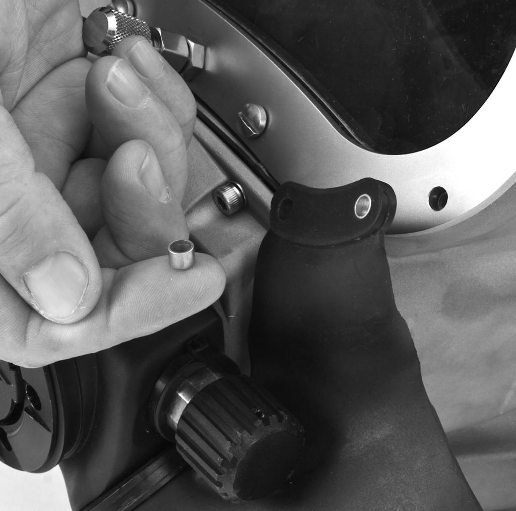 Reinstalling the Regulator onto the Helmet rubber grooves at the back of the whisker, to the grooves on the pod (stainless steel helmet).