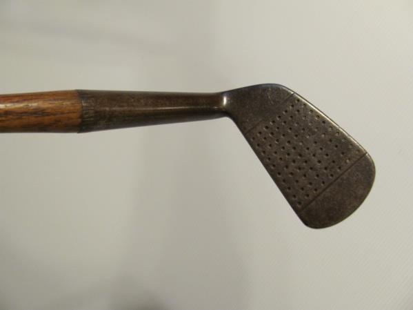 Fairlie, Peter McEwan, Southport, Smith s anti Shank iron, Niblick, with Warranted Hand Forged McEwan Special on the back of the head, original shaft, with a unique Holdfast India Rubber