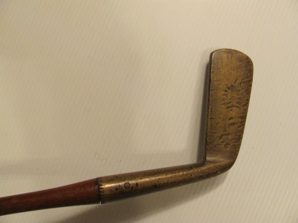 Cann, a gun metal heavy blade putter, reshafted with a greenheart shaft, with just the wool listing