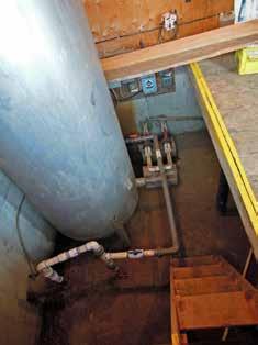 Well pits (potable water) A well pit is the chamber at the top of a wellhead. A chamber located under the floor of a building is considered a confined space.