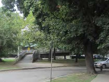 The existing pedestrian bridge does not meet current ADA, AAB, or MAAB requirements.