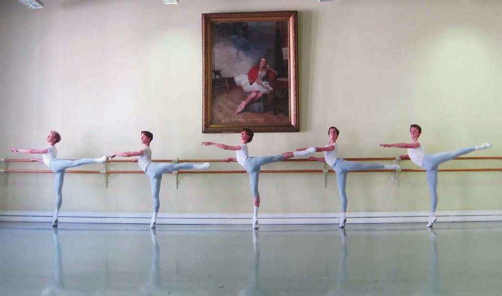 The fifth-year boys class, instructed by pedagogue Nikita Scheglov, demonstrates an arabesque at the barre in the Marina Semyonova Studio.