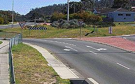IN058 - Intersections When you wish to turn left at a roundabout you indicate - - Left from start to finish.