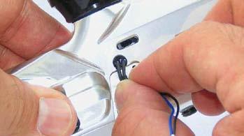 Remove both Eye Sensor Covers (one on each side) by removing Retaining Screw. 2.