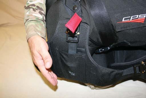 54. A small Velcro pouch just below the Cobra adapter is designed to hold the excess adjustment webbing. 55.