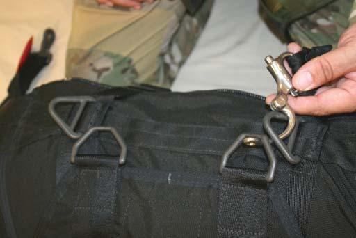 Such as Jumper s left or Jumper s right. 2. Open the Snap Shackle of the left Upper Attachment Hardware.