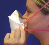 For valved respirators, cup both hands over the respirator and inhale sharply.