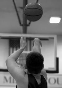 Your elbow and wrist should extend in a straight line to the basket.