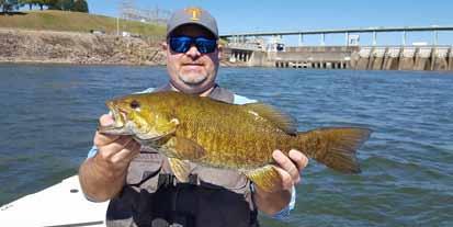 We are a FULL TIME guide service, targeting ALL east Tennessee species: Trophy Striper, Trout, Catfish, Bass, Crappie, White bass, Sauger and