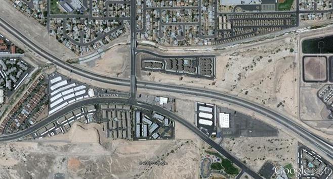 Figure 14: Reverse curve located on US 95 and Russell Rd interchange, curve with smaller radius circled More complicated curves such as spiral and combination curves, similar to the reverse curve