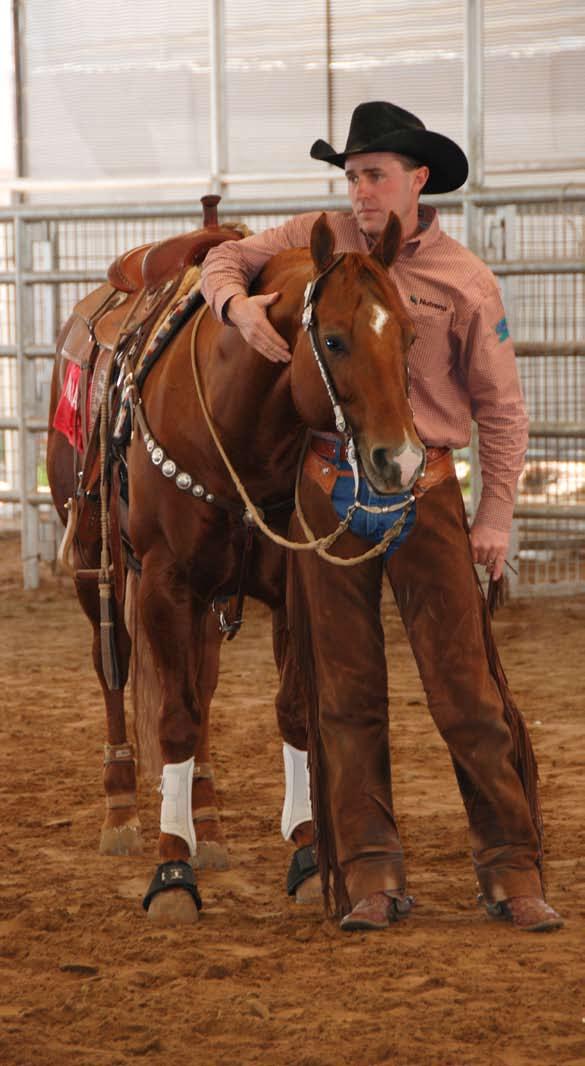 (Above) Phil and Nancy took home some nice awards for Sheza Shinette s status as 2010 AQHA Leading NRHA Dam.