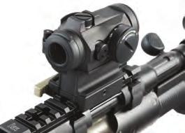 of optics and accessories. Thumb indentation on protective handguard.