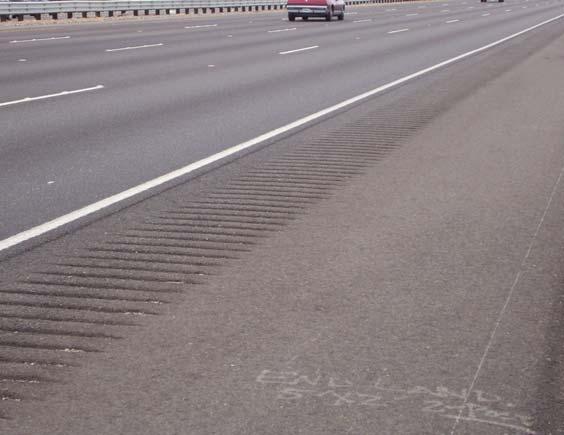 Right freeway shoulder with grooves RUMBLE STRIP TYPES Milled-in: in: cutting or grinding Rolled: steel wheel roller over hot asphalt Formed: Added
