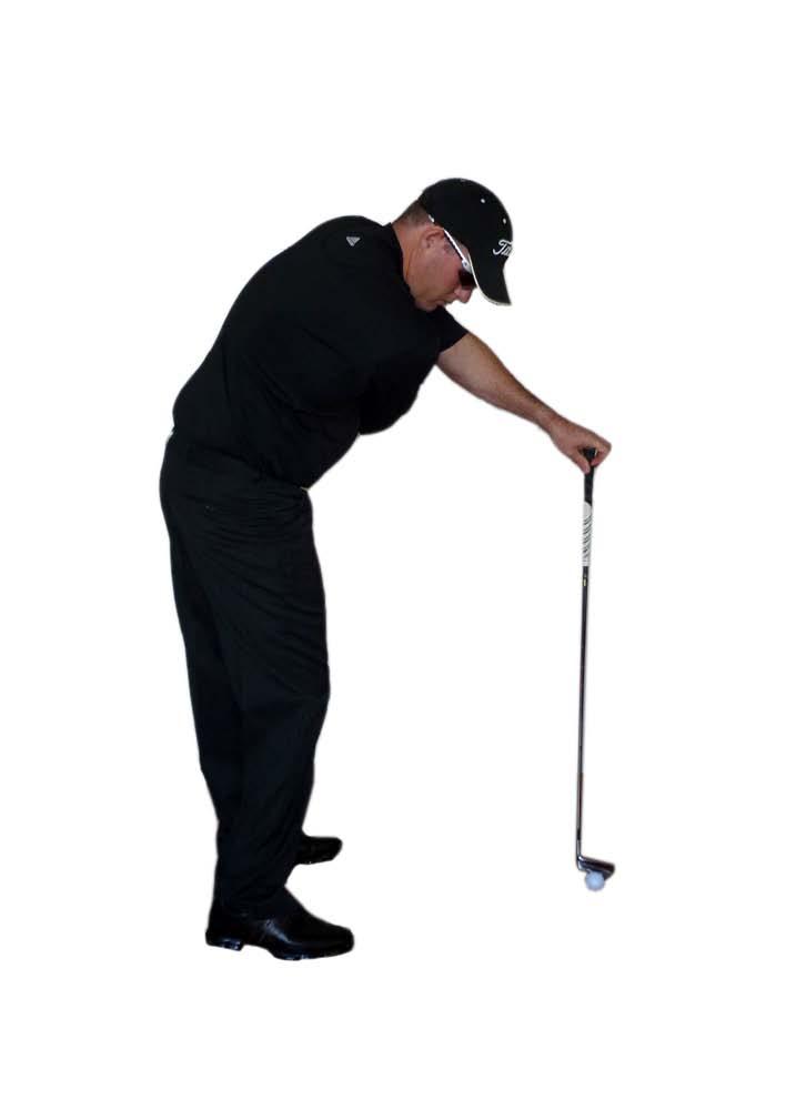 Swing your right arm down and under, keeping the left arm in pretty much the same position that it was at address.