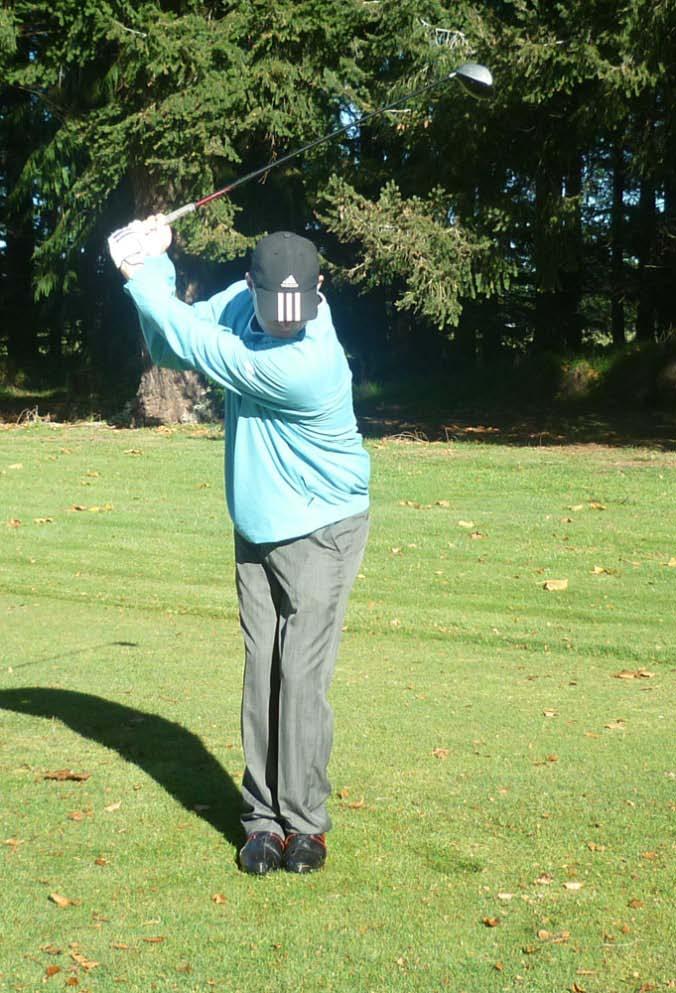 Then swing to the top of your backswing and stop.
