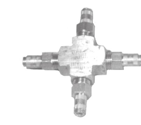 Another fitting similar to a tee is a cross. A cross is shaped like a plus sign and provides connections to three branch circuits.
