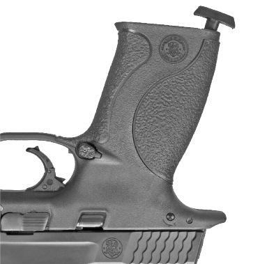 With the barrel still pointing in a safe direction, and with your finger off the trigger and outside the trigger guard, grasp the serrated sides of the slide from the rear with the thumb and fingers
