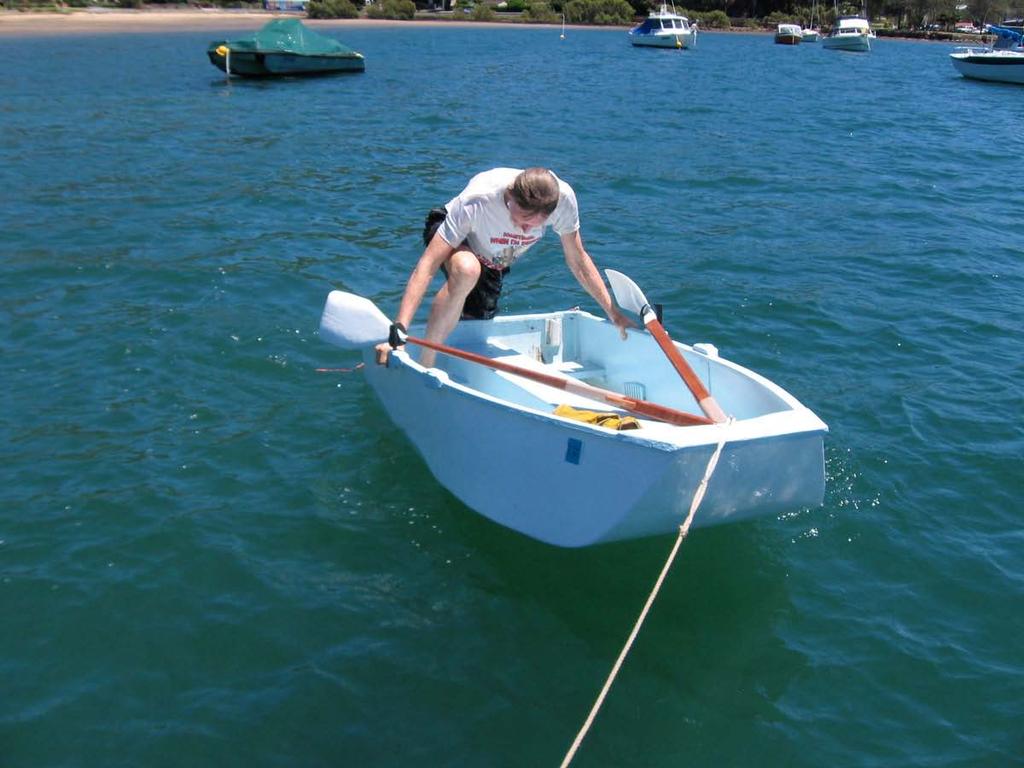 Re-entering the dinghy after falling overboard. So there you go, if you want to have a little fun building a useful dinghy try the Kiss dingy.