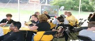 Eagle Village Football Hospitality Private, tent-covered location on Pride Field for pre-game