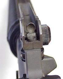 With the backup iron sight (BUIS) ensure the windage index mark is centered on the windage scale, figures 7.