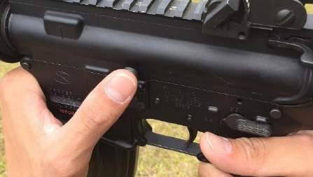 While keeping the muzzle pointed in a safe direction ensure rifle is on safe, Figure 2.5. b.