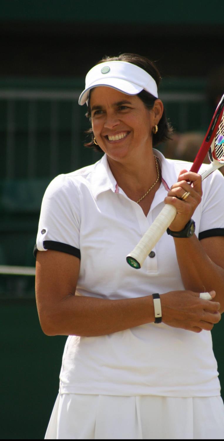 Our Coach Gigi Fernandez, born in San Juan, Puerto Rico, burst onto the tennis scene by reaching the NCAA finals as a freshman, then turning professional in 1983 and becoming Puerto Rico's first