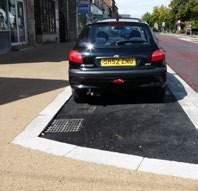 parking bay inset into widened footway, Stonehouse Central margin