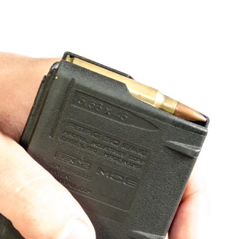 Do not use ammunition that fails to meet these requirements. Insert ammunition with the primer end toward the end of the Magazine with the raised lips.
