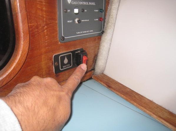 The HOLDING TANK is located through access panel behind lower stateroom stairs.