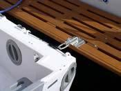 removable, rugged stainless steel, davit system to secure dinghy to boats with swim platforms Stabilizes boat for boarding and disembarking Allows the Pudgy to hinge up out of the water Two removable