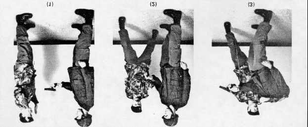 Figure 13-13 Pistol in Front POINTS ABOUT RIFLES AND PISTOLS 26. If you can't reach the pistol or rifle with a fast hand movement, don't try it. Hopefully, you'll get the chance later. 27.