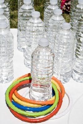 Water Bottle Ring Toss Fill bottles with water and set them in a triangle shape about 4 feet from where the children will be throwing the rings. Make a triangle from 6, 10 or 15 bottles.