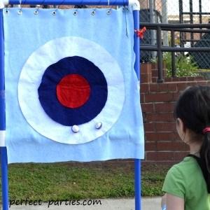 Velcro Bulls Eye MATERIALS Dart Velcro Balls Tape INSTRUCTIONS Set up board and mark where you want children to stand with a taped line Give each child 3 balls to throw.